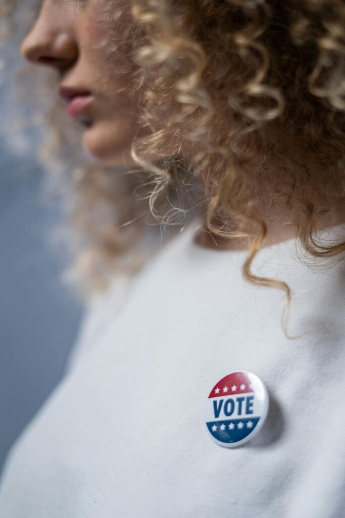 woman-with-a-vote-pin-4669099/